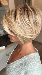 Madeline wearing IGNITE LARGE by JON RENAU in 22F16S8 VENICE BLONDE | Light Ash Blonde and Light Natural Blonde Blend, Shaded with Medium Brown