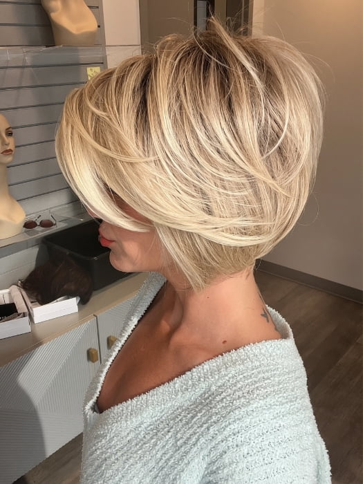 Madeline wearing IGNITE LARGE by JON RENAU in 22F16S8 VENICE BLONDE | Light Ash Blonde and Light Natural Blonde Blend, Shaded with Medium Brown