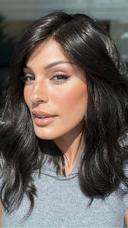 Roxie is wearing HEIDI by JON RENAU in color 4 BROWNIE FINALE | Dark Brown