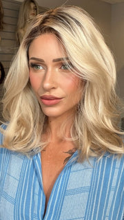 Madeline wearing AMANDA by ENVY in PLATINUM SHADOW | Light Blonde with Dark Roots
