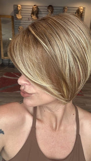 Madeline is wearing IGNITE PETITE by JON RENAU in FS26/31S6 SALTED CARAMEL | Medium Natural Red Brown with Red Gold Blonde Bold Highlights, Shaded with Brown