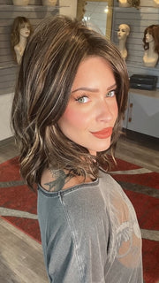Madeline wearing MODENA by BELLETRESS in DARK BROWN HL | A Blend of Dark Brown, Strawberry Light Auburn and Soft Chunky Medium and Dark Blonde Highlights