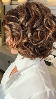 Madeline wearing HOUSTON by BELLETRESS in FRENCH ROAST BROWN-R  | A deep, luxurious brunette featuring a dark brown base with warm bronze and subtle red undertones. Softly rooted for natural depth and dimension.