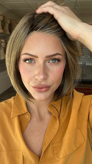 Madeline is wearign ALL THE RAGE by GABOR in GF12-22SS SHADED CAPPUCCINO | Light Golden Brown Evenly Blended with Cool Platinum Blonde Highlights with Dark Roots