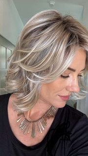 Jenny @thewiggygirl wearing CROWD PLEASER by RAQUEL WELCH in color RL19/23SS SHADED BISCUIT | Light Ash Blonde Evenly Blended with Cool Platinum Blonde and Dark Roots