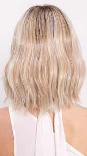 Ava wearing HOLLIE PETITE by JON RENAU in 101/88/27S8 CATALINA BLONDE | Pale blonde with Pure White Natural Violet halo highlights, shaded medium brown