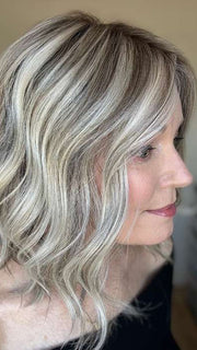 Mel B. @mels.be.ageless wearing SIMMER ELITE PETITE by RAQUEL WELCH WIGS in color RL17/23SS ICED LATTE MACCHIATO | Honey Blonde shaded with Cool Blonde with Dark Roots. 
