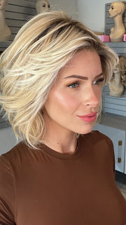Madeline wearing NEW WAVE by TRESSALLURE in 24/102/R12 | Gold Blonde with Platinum highlights with Gold Brown roots