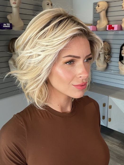 Madeline wearing NEW WAVE by TRESSALLURE in 24/102/R12 | Gold Blonde with Platinum highlights with Gold Brown roots