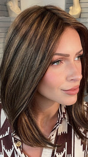 Madeline wearing SOPHISTICATE by TRESSALLURE in SSB6/31/830 |Medium Dark Brown Light Auburn Blend Medium Brown Medium Auburn Highlights.