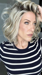 Kristyna Moore @kristynamoore wearing DIRECTORS PICK by RAQUEL WELCH WIGS in color RL19/23SS SHADED BISCUIT | Light Ash Blonde Evenly Blended with Cool Platinum Blonde with Dark Roots (window lighting)
