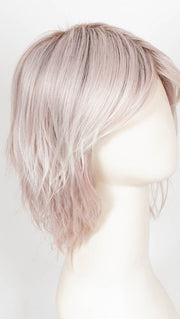 POLARIZING PINK | Icy platinum blonde blended with soft rose and silver undertones. Medium ash brown roots add dimension and depth. 
