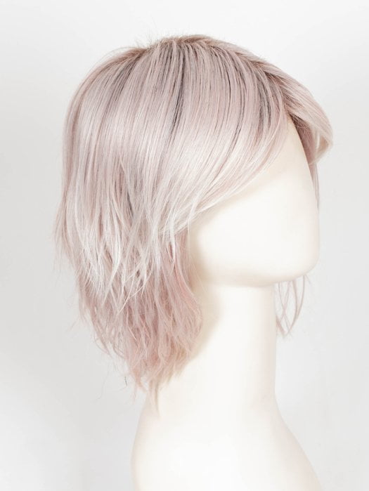 POLARIZING PINK | Icy platinum blonde blended with soft rose and silver undertones. Medium ash brown roots add dimension and depth. 
