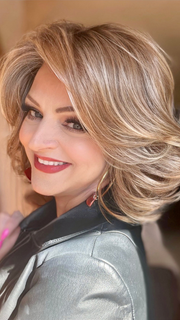 Sandy @i_be_wiggin wearing CROWD PLEASER by RAQUEL WELCH WIGS in color RL14/22SS SHADED WHEAT | Dark Blonde Evenly Blended with Platinum Blonde and Dark Roots