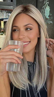 Roxie @thelovelyroxx wearing SLEEK by ELLEN WILLE in color PEARL BLONDE ROOTED 101.20.25 | Pearl Platinum Blended with Light Strawberry Blonde and Lightest Golden Blonde with Shaded Roots