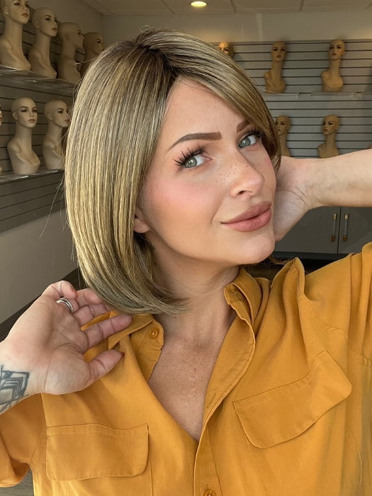 Madeline is wearign ALL THE RAGE by GABOR in GF12-22SS SHADED CAPPUCCINO | Light Golden Brown Evenly Blended with Cool Platinum Blonde Highlights with Dark Roots