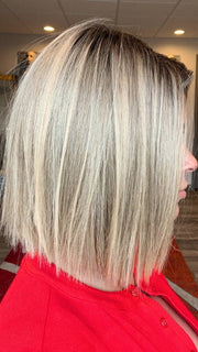 Madeline is wearing SANTA MONICA by BELLETRESS in RAW SUGAR BLONDE | A Neutral Light Blonde, Honey Blonde, Pale Gold Blonde, with a base of Light Brown Low Lights featuring a Medium Root Color
