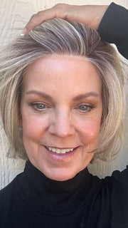 Susan @an_affair_with_hair wearing FLASH FORWARD by RAQUEL WELCH WIGS in color RL19/23SS SHADED BISCUIT | Light Ash Blonde Evenly Blended with Cool Platinum Blonde with Dark Roots