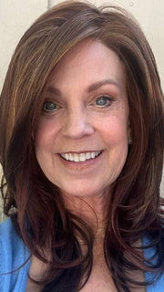 Susan @an_affair_with_hair wearing MIRANDA by JON RENAU in color 32F CHERRY CREME | Medium Red & Medium Red-Gold Blonde Blend with Medium Red Nape | window natural lighting