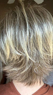 Mel B. @mels.be.ageless wearing COCO by RENE OF PARIS in color FROSTI-BLONDE | Platinum Blonde and Light Ash Brown evenly blended
