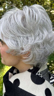 Mel B. @mels.be.ageless wearing VOLTAGE ELITE by RAQUEL WELCH WIGS in color R56/60 SILVER MIST | Lightest Gray with 20% Medium Brown Evenly Blended with Pure White