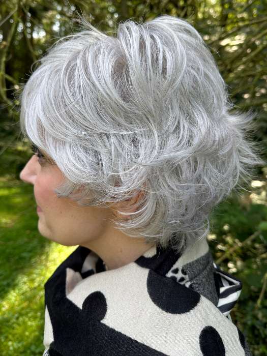 Mel B. @mels.be.ageless wearing VOLTAGE ELITE by RAQUEL WELCH WIGS in color R56/60 SILVER MIST | Lightest Gray with 20% Medium Brown Evenly Blended with Pure White