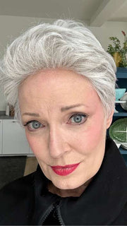 Mel B. @mels.be.ageless wearing STRAIGHT CHIC by RAQUEL WELCH WIGS in color RL56/60 SILVER MIST | Lightest Grey Evenly Blended with Pure White