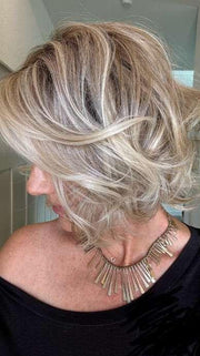 Jenny @thewiggygirl wearing CROWD PLEASER by RAQUEL WELCH in color RL19/23SS SHADED BISCUIT | Light Ash Blonde Evenly Blended with Cool Platinum Blonde and Dark Roots