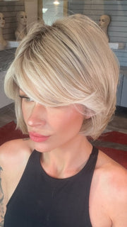 Madeline wearing NAOMI by JON RENAU in 101/88/27S8 CATALINA BLONDE | Pale blonde with Pure White Natural Violet halo highlights, shaded medium brown 