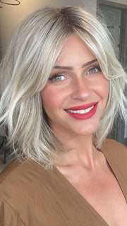 Madeline wearing EMILIA by BELLETRESS in BUTTERBEER R | Dark Brown Base and Root that transitions smoothly into a buttery blonde, infused with creamy honey and toffee tones