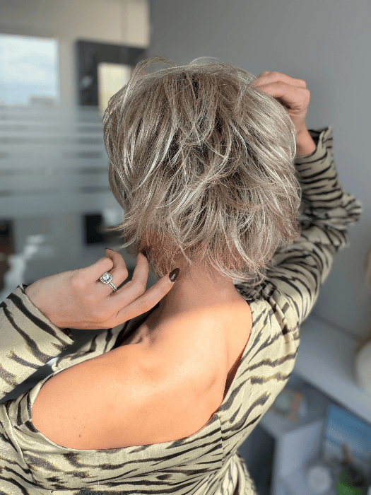 Model is wearing SKY in EXCLUSIVE COLOR ARABIAN SAND | Neutral Chocolate Brown Roots fade into a Neutral Blonde Base, blended with Sandy, Chestnut, Golden, and Honey Blondes, with Soft Creamy Blonde Highlights and Face-Framing Lowlights. 