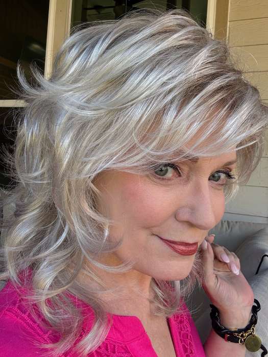 Mel B. @mels.be.ageless wearing TRESS by RAQUEL WELCH WIGS in color R23S GLAZED VANILLA | Cool Platinum Blonde with Almost White Highlights
