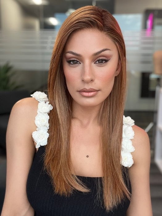 Roxie is wearing CHAMPION by BELLE TRESS in color AUBURN SPICE R | A Deep Auburn Shade with Darker Roots and subtle highlights in Copper and Golden Spice Tones