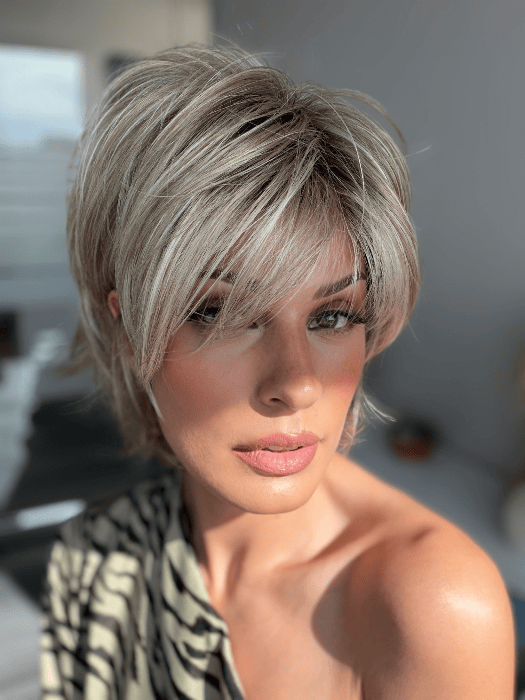 Model is wearing SKY in EXCLUSIVE COLOR ARABIAN SAND | Neutral Chocolate Brown Roots fade into a Neutral Blonde Base, blended with Sandy, Chestnut, Golden, and Honey Blondes, with Soft Creamy Blonde Highlights and Face-Framing Lowlights. 