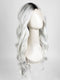 Model is wearing ETHEREAL ICE | Natural dark roots melt into an icy white shade for a beautiful contrast. 
