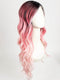 Model is wearing BUBBLEGUM BABE | Dark roots transition into a soft raspberry shade and gradually pales to soft pastel ends. 