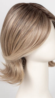 Styled with heat and a larger curling iron | Color: 12FS8