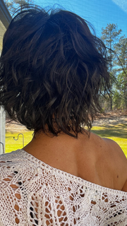 Jenna Fail @jenna_fail wearing BREEZY WAVE CUT by HAIRDO in color R4 MIDNIGHT BROWN | Darkest Brown