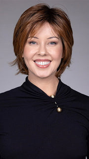 Model is wearing MIXED BERRY R | A bold, berry-inspired red with deep auburn tones and soft rooting for a natural regrowth effect.