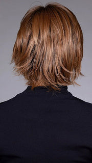 Model is wearing MIXED BERRY R | A bold, berry-inspired red with deep auburn tones and soft rooting for a natural regrowth effect.