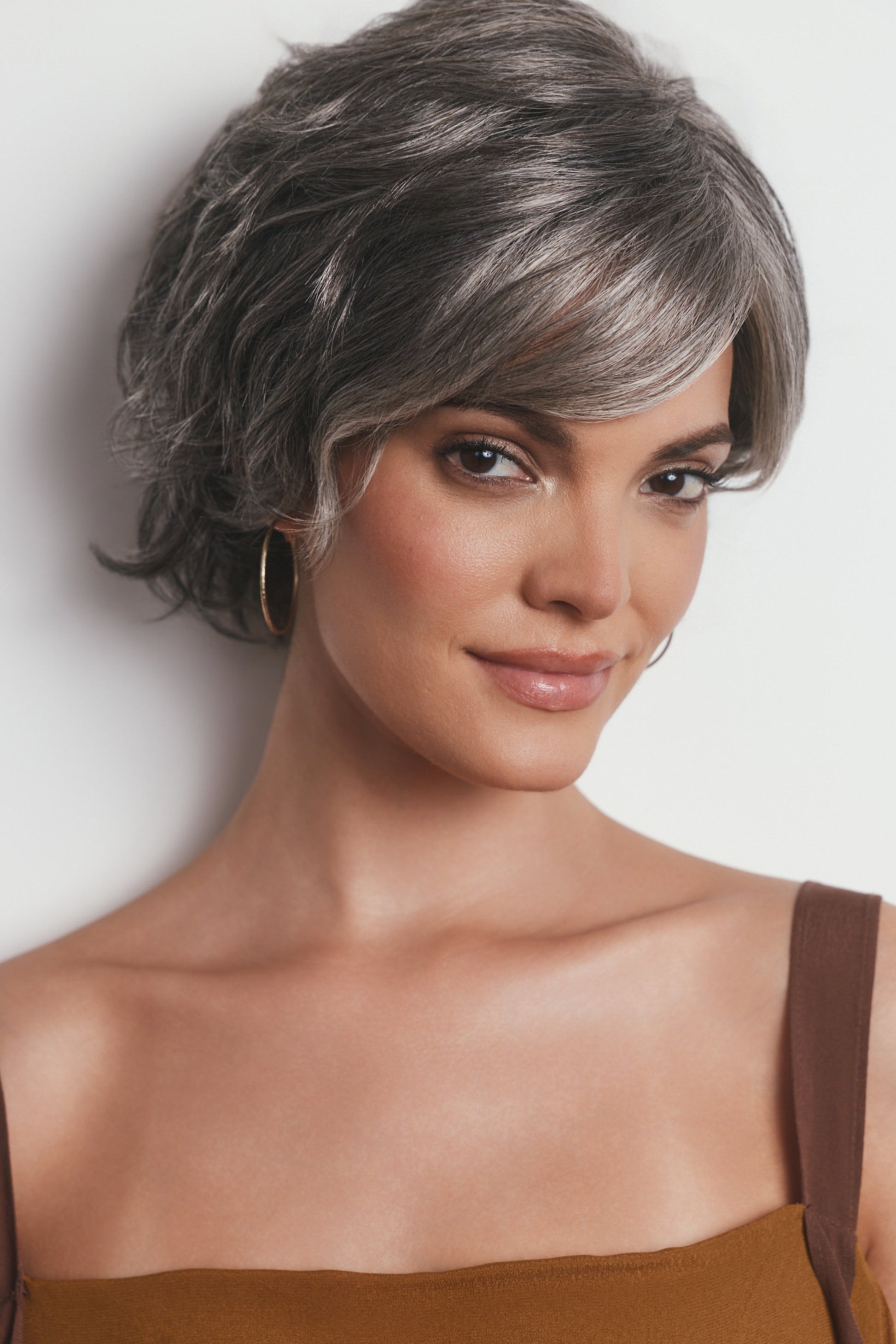 Model is wearing ASHA by RENE OF PARIS in MOONLIT SILK | A dark gray tone that features a multitude of metallic shades running throughout