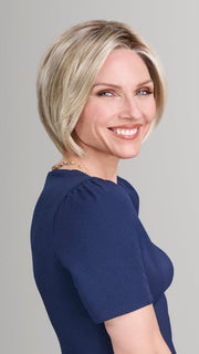 Model is wearing AVA in 22F16S8 VENICE BLONDE | Light Ash Blonde and Light Natural Blonde Blend Shaded with Medium Brown
