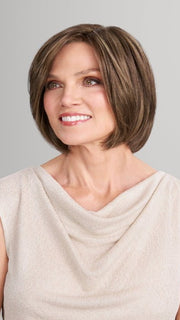 Model is wearing AVA in 8RH14 MOUSSE CAKE | Medium Brown with 33% Medium Natural Blonde Highlights