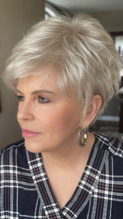 Donna @style.me.ageless wearing SPARKLE by RAQUEL WELCH WIGS in color R23S+ GLAZED VANILLA | Cool Platinum Blonde with Almost White Highlights