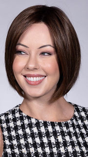 SOFT AMBER BROWN-R 6/33+4 | A warm rooted, amber-toned shade blending golden and red hues over a medium brown base. 