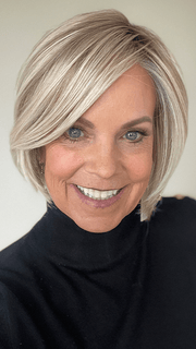 Susan Sparks @sparkles_intheworld wearing STRAIGHT UP WITH A TWIST by RAQUEL WELCH WIGS in color RL19/23SS SHADED BISCUIT | Cool Platinum blonde with subtle highlights and medium brown roots
