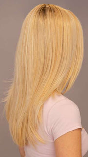 Model is wearing Leading Edge by TressAllure in shade 24/102/R12 | Gold Blonde with Platinum highlights with Gold Brown roots