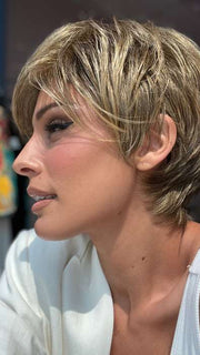 Model is wearing SHARI by ENVY in color 24/18 FROSTED | Light Brown with Wheat Blonde blended highlights