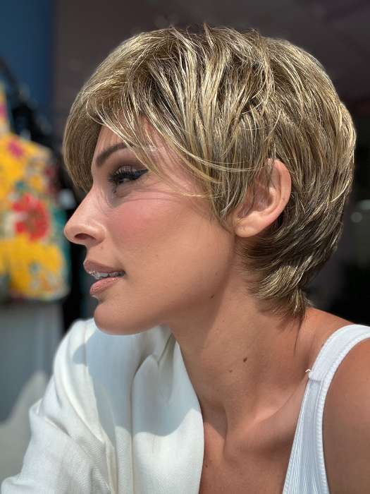 Model is wearing SHARI by ENVY in color 24/18 FROSTED | Light Brown with Wheat Blonde blended highlights