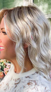 Marcie Mertz @wig.obsessed wearing AERI by ESTETICA in color SUNLIT-BLONDE | Soft Blend of Sandy Blonde, Lightest Blonde and Iced Blonde with a Light Golden Brown Root